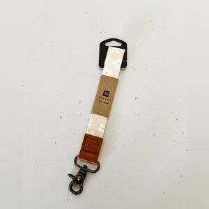 NWT: Thread Wristlet luna beige and leather Keychain floral detail